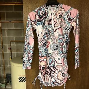 Rash guard has never been worn brand. New tags have just been removed.